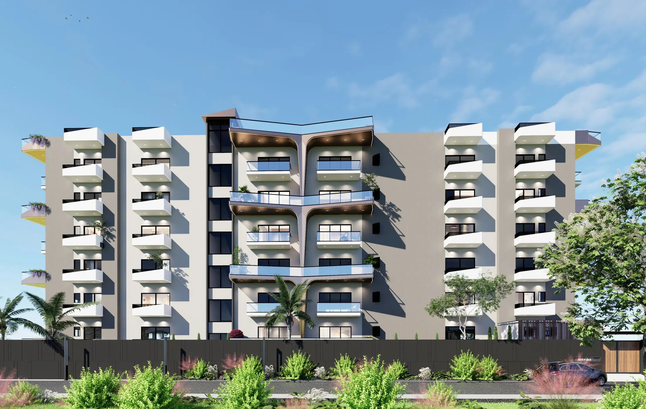 Front view of Rajpati Enclave with repeated balcony frames and landscaped frontage