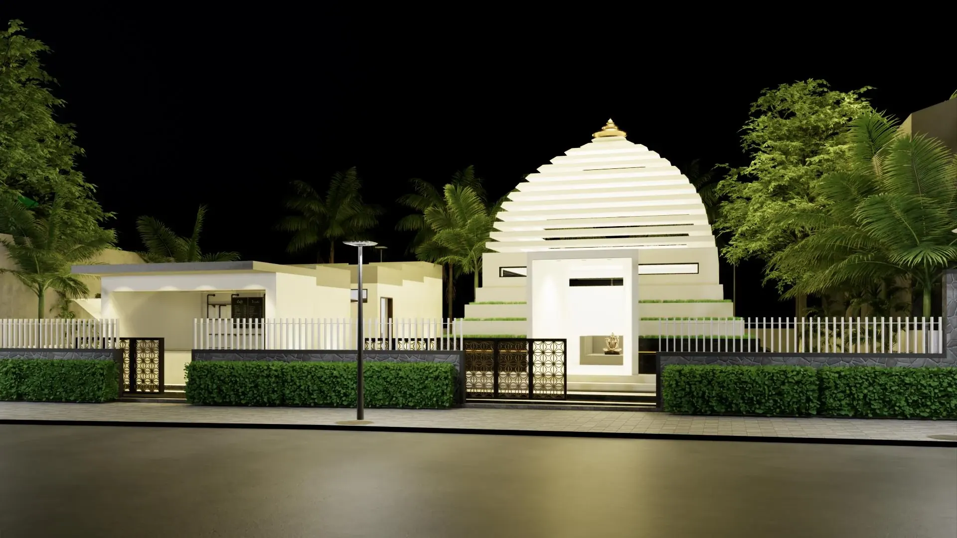 Elevated night view of the temple complex and planted surroundings