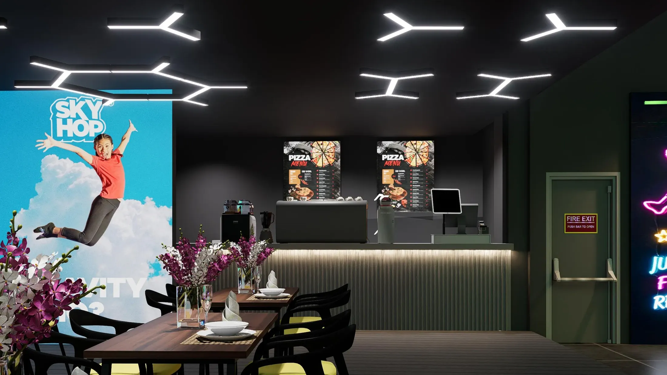 Cafe seating and serving counter framed by geometric ceiling lights