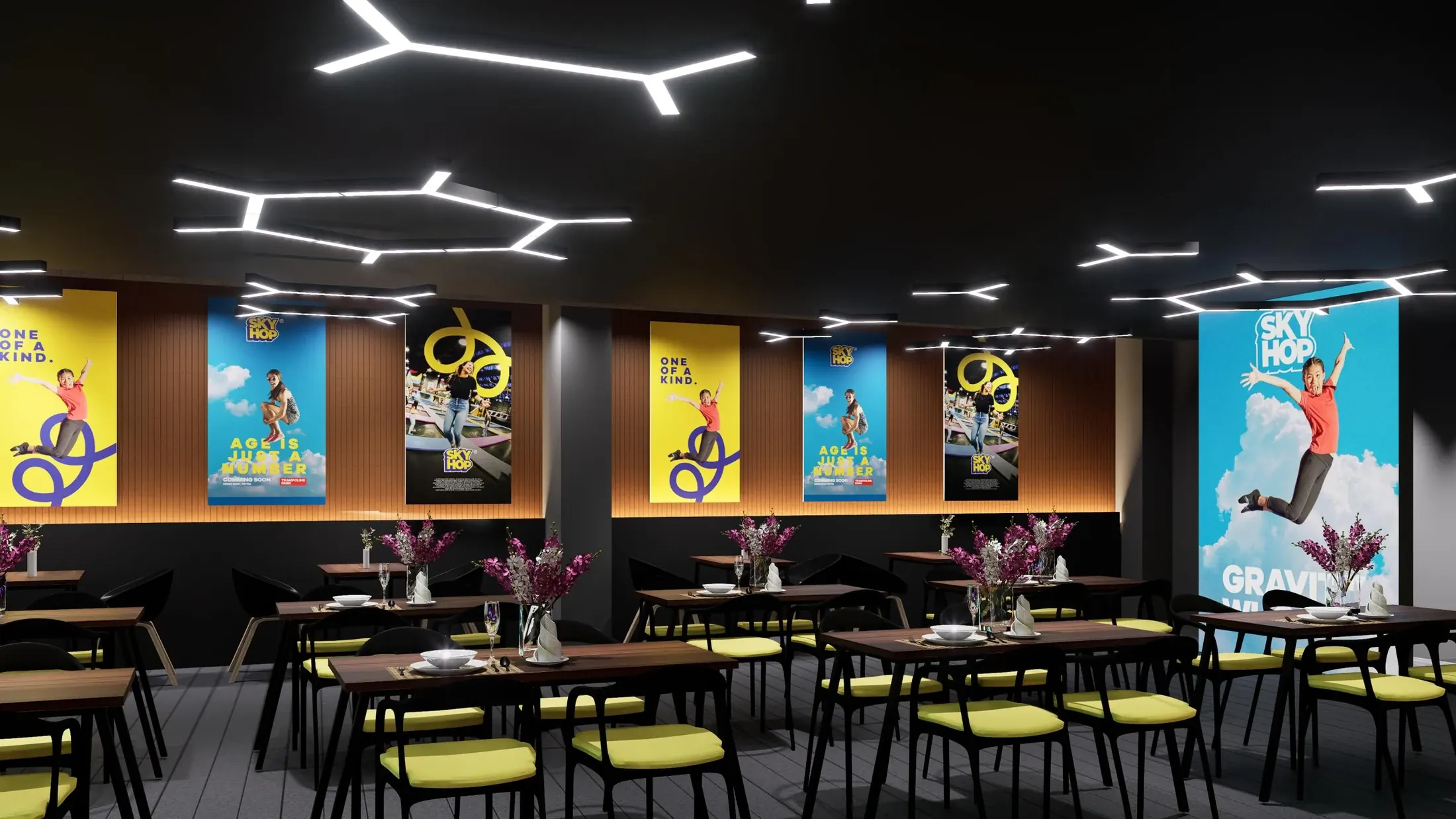 Dining area with colourful sports graphics and dark seating