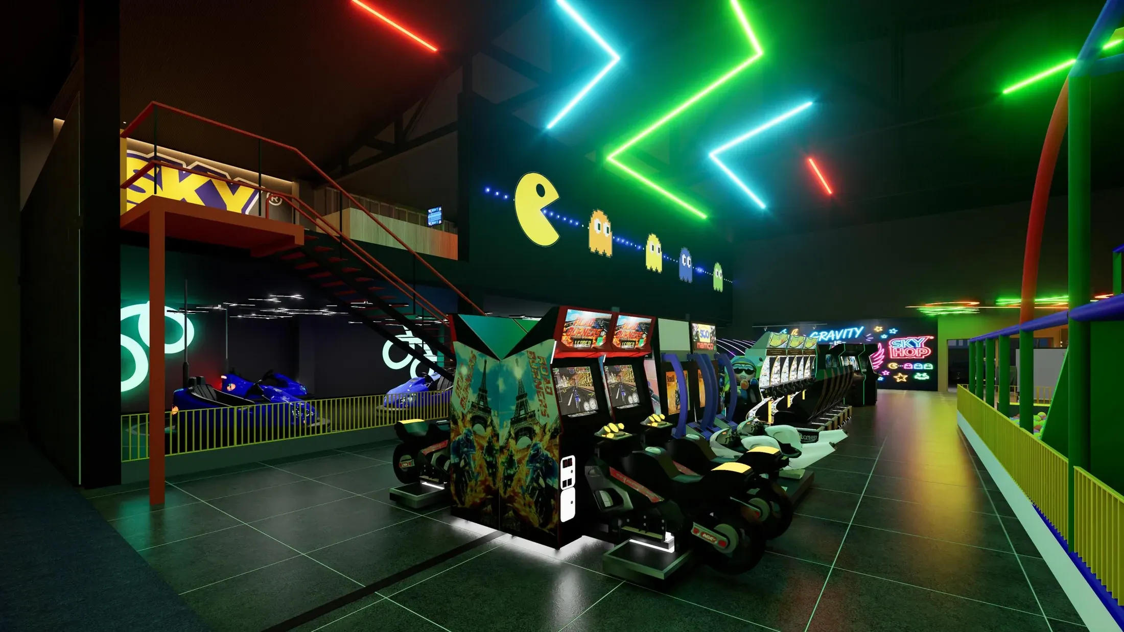 Arcade machines and soft-play area framed by coloured lighting
