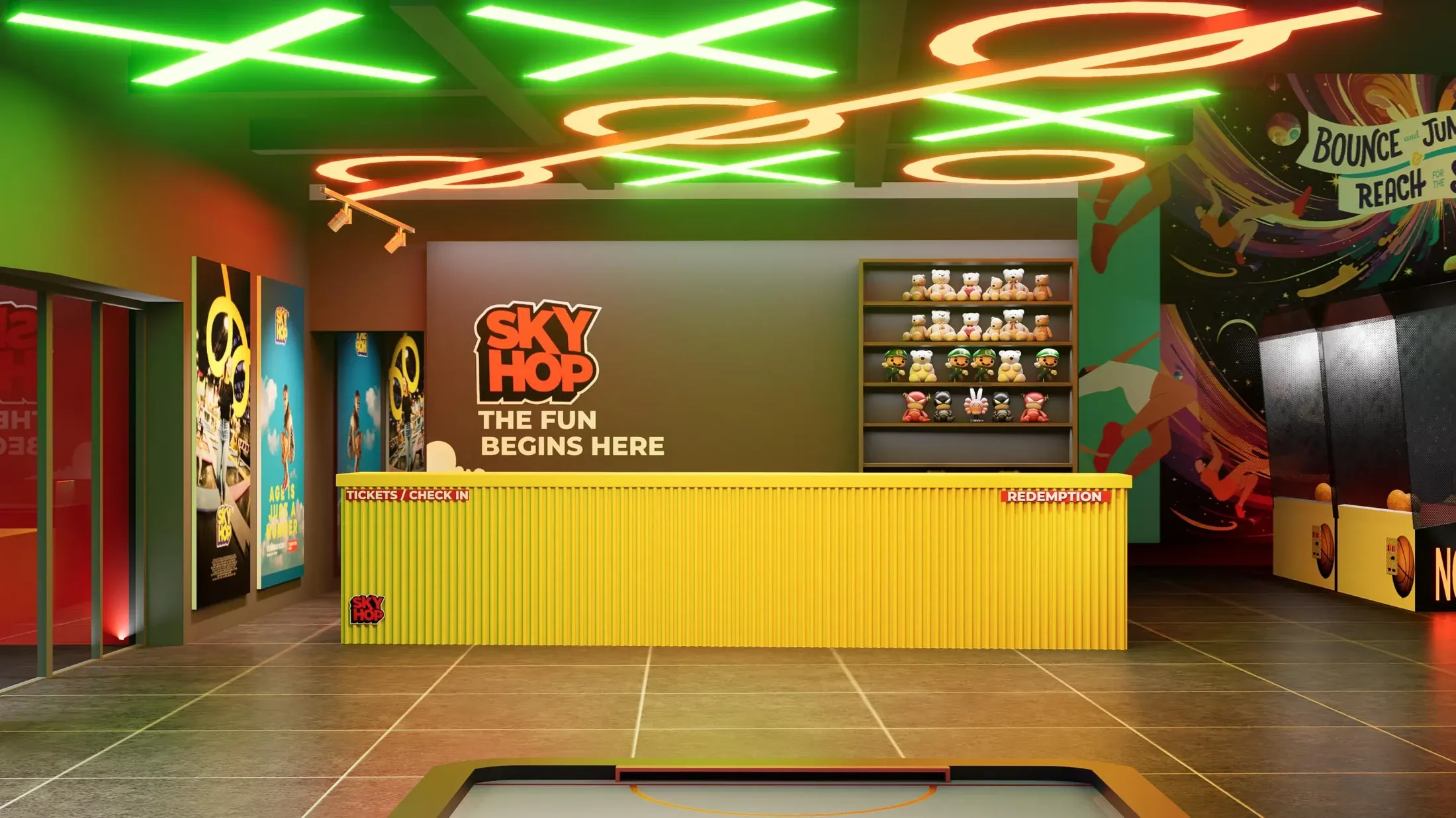 Yellow reception desk beneath geometric coloured ceiling lights
