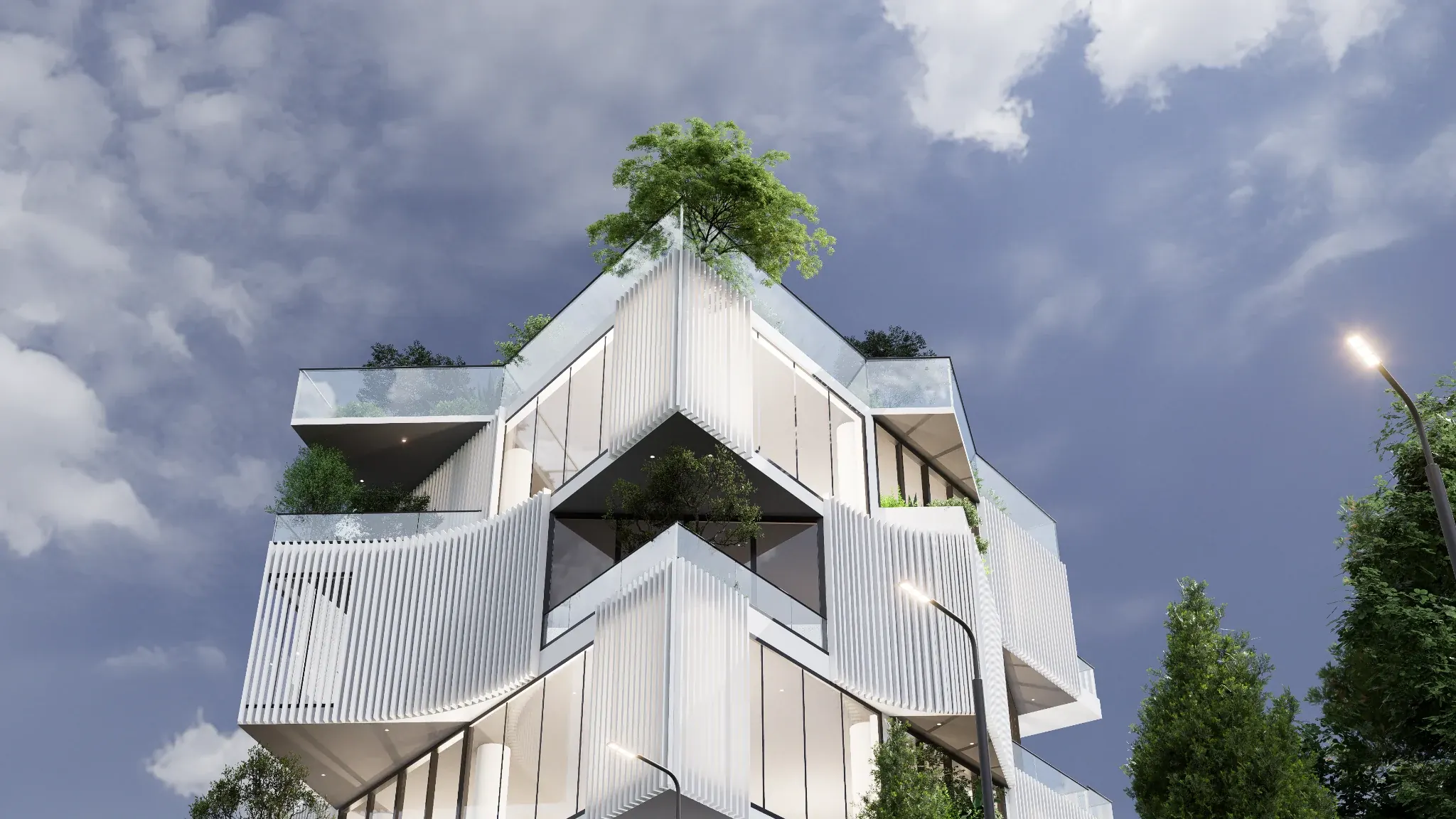 Upward facade view of vertical screens, glass corners and trees on the upper terraces